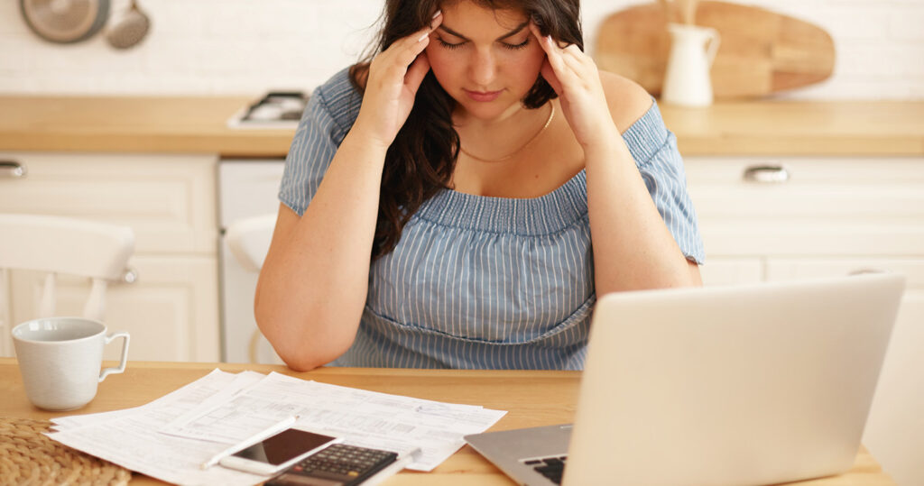 Woman Frustrated with Bills